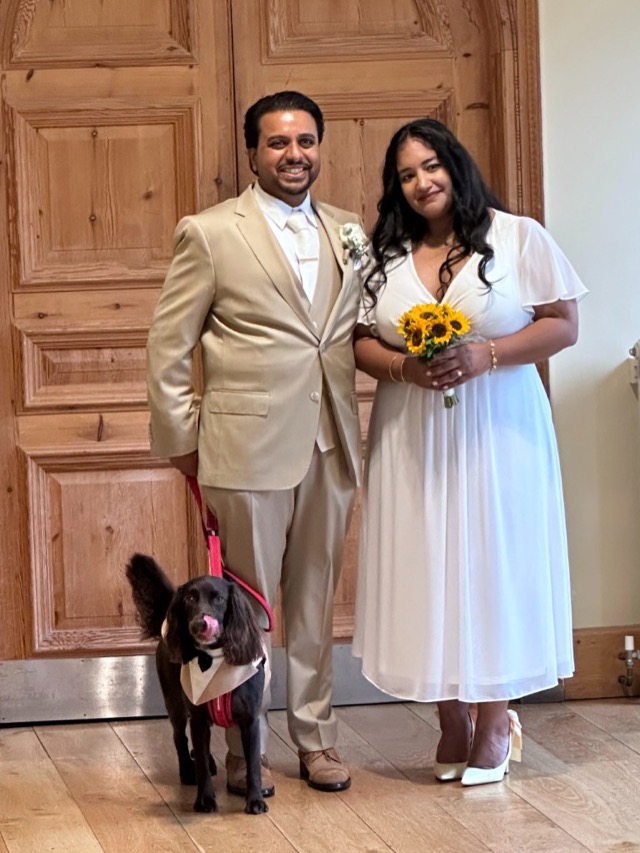 Jinesh and Meha with their dog at their wedding